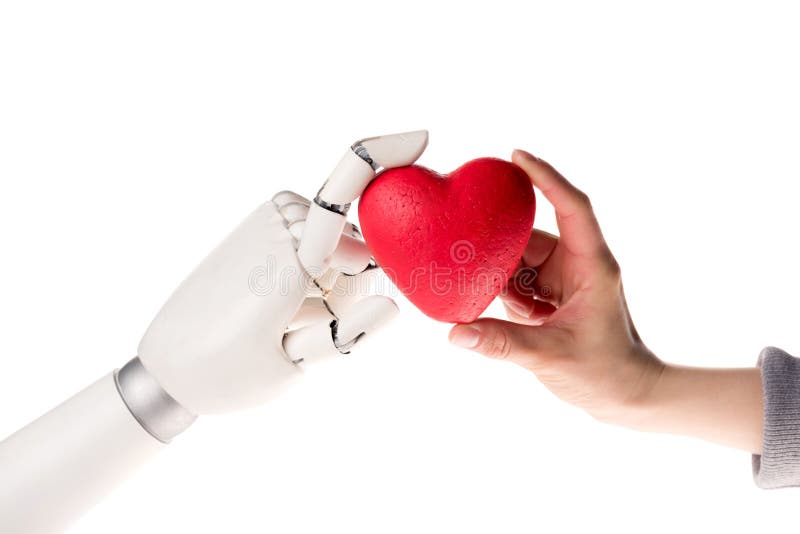 cropped image of robot and woman holding heart together