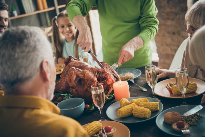 Cropped Photo of Full Family Sit Feast Dishes Table Near Roasted Turkey ...