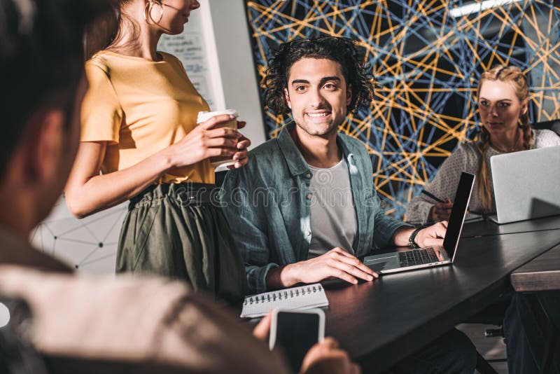 cropped shot of business colleagues having meeting at table with laptops in modern royalty free stock images cropped shot of business colleagues having meeting at table with laptops in modern royalty free stock images