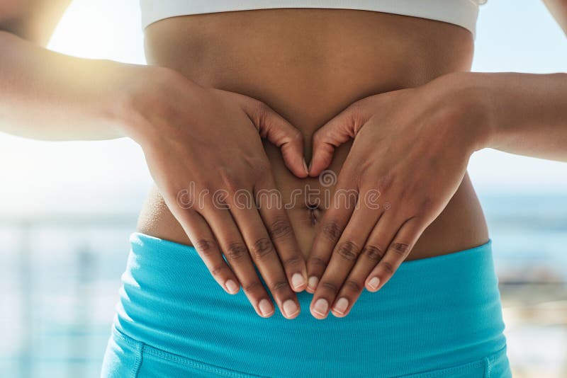 Laughing, body or holding pregnancy stomach in underwear on studio  background protection, woman lov Stock Photo by YuriArcursPeopleimages