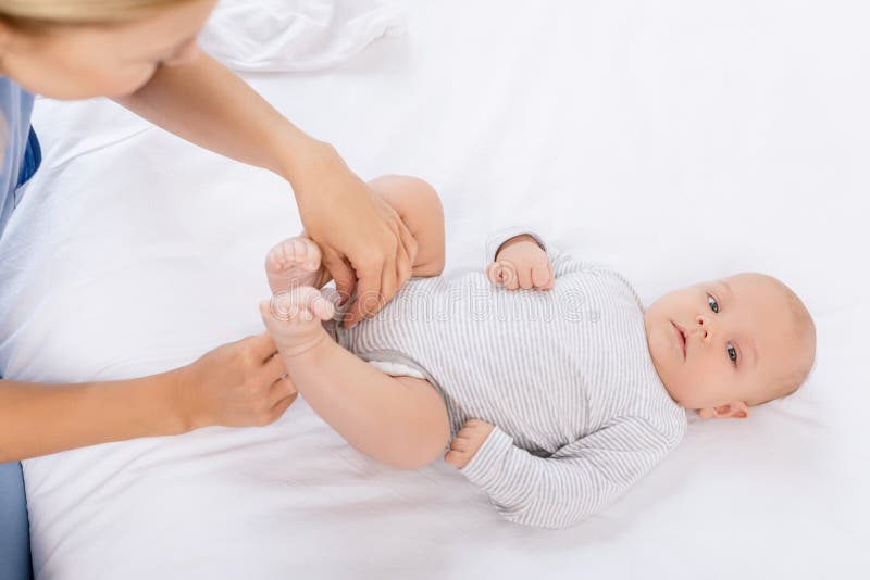 Dressing baby stock photo. Image of newborn, innocence 6448600