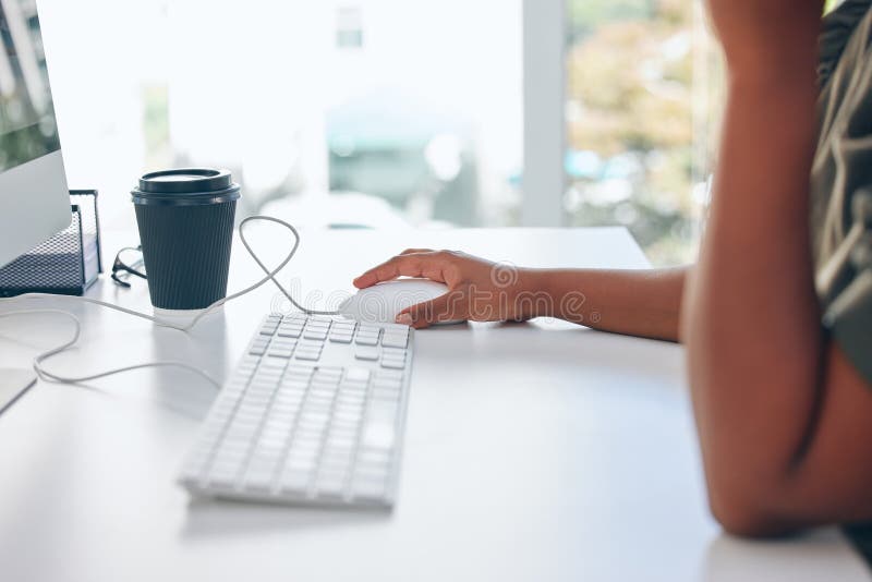 All I have to to now is to click send. Cropped shot of an unrecognizable woman working on her computer.