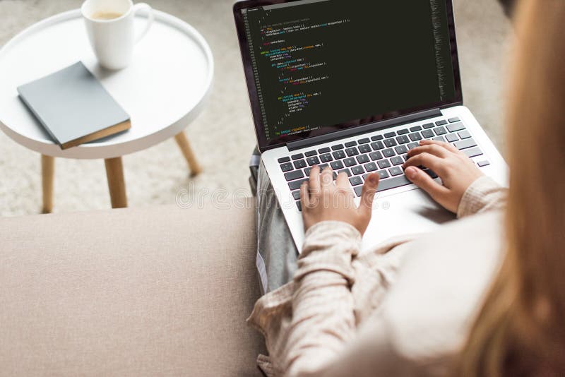 cropped shot of young female developer coding with laptop royalty free stock images cropped shot of young female developer coding with laptop royalty free stock images