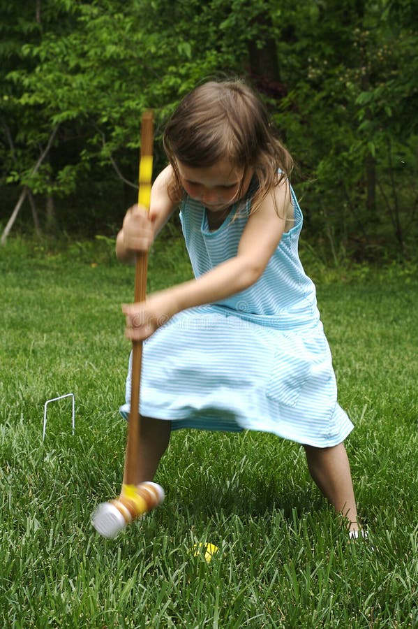 Girl playing croquet stock image. Image of outside, closeup 21561021