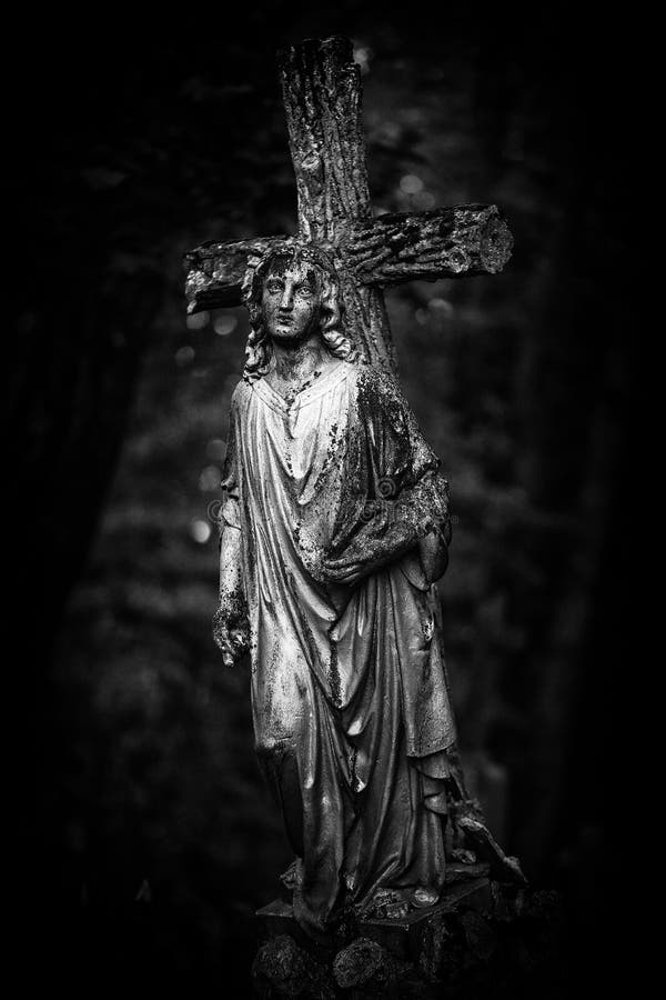 Cross and angel statue stock photo. Image of background - 94477844