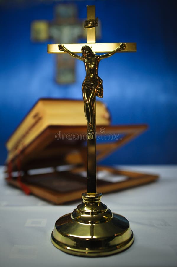 Golden rood and bible in the background. Golden rood and bible in the background