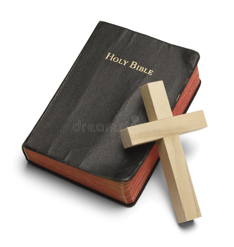 Worn Bible with Wooden Cross Isoalted on White Background. Worn Bible with Wooden Cross Isoalted on White Background.