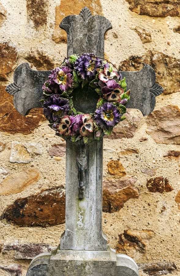 Cross With A Bouquet Of Flowers Stock Image Image of wall, faith