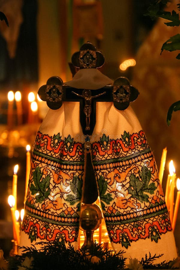 Cross and candles in church