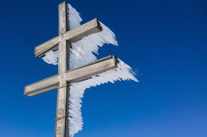 Cross covered with ice. Slovakia