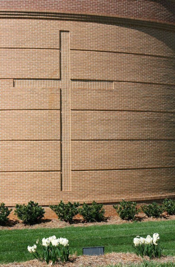 Cross on Curved Brick Wall