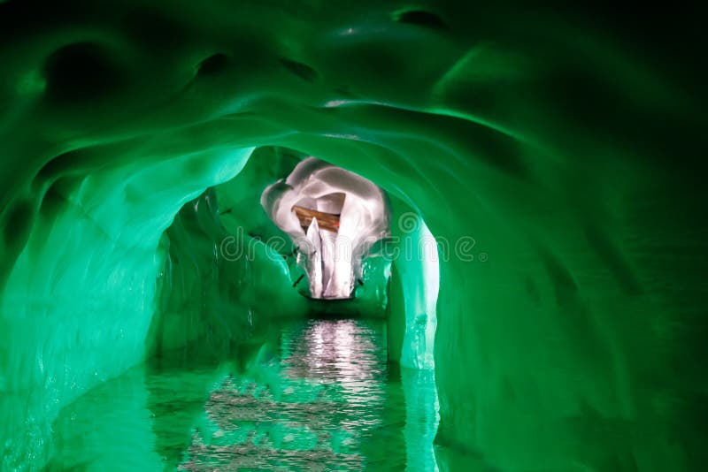 Cross inside the Natural Ice Palace Ice Cave at the top of Hintertux Glacier., Austria.