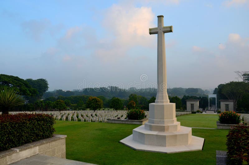 Cross of Sacrifice and tombstones at World War Two soldiers Kranji War Cemetery Singapore royalty free stock images Cross of Sacrifice and tombstones at World War Two soldiers Kranji War Cemetery Singapore royalty free stock images