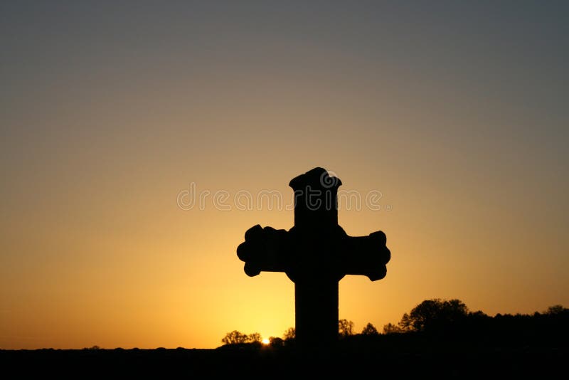 Cross in the sunrise