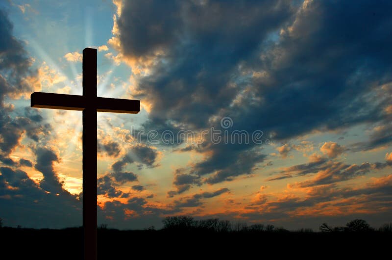 Kreuz und Sonnenuntergang.