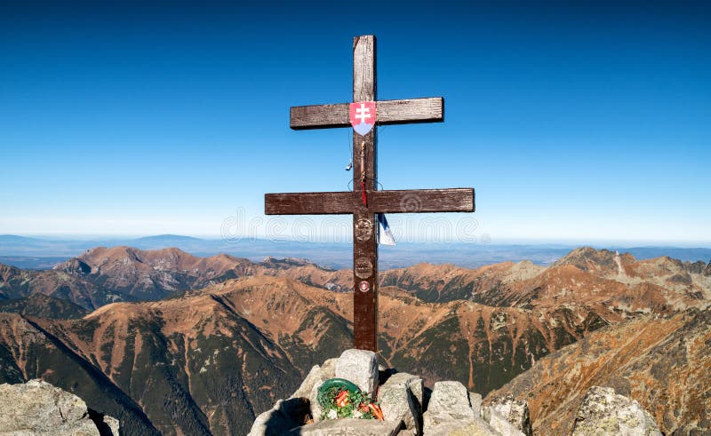 Cross at top of the peak Krivan in High Tatras mountains at Slovakia