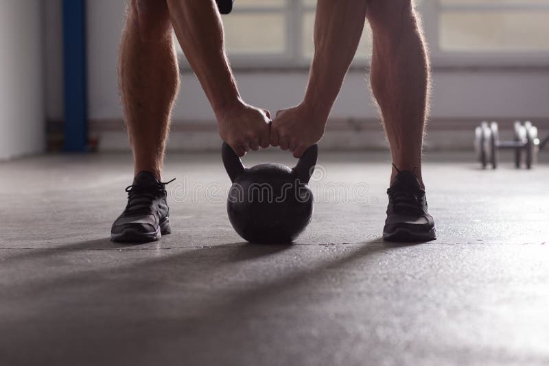 Crossfit - kettlebell training backlit stock images Crossfit - kettlebell training backlit stock images