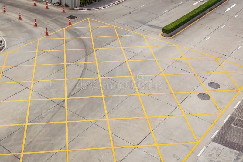 Crossing with road marking white arrows and rectangles on asphal royalty free stock photos