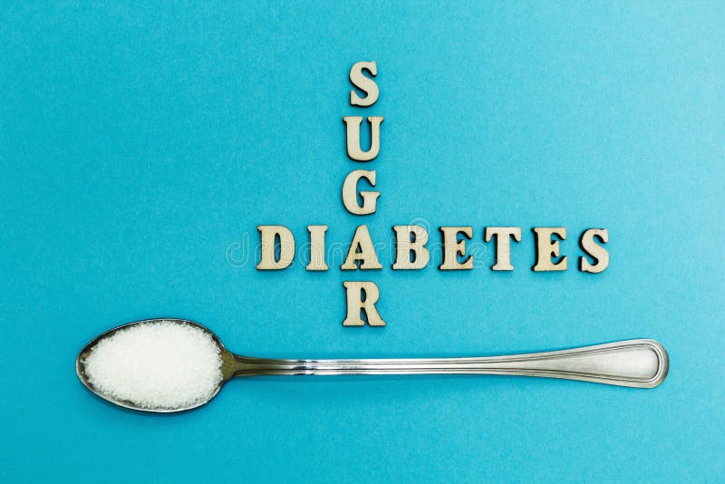 Crossing the Words `sugar` and `diabetes`, a Spoon with Sugar on a Blue