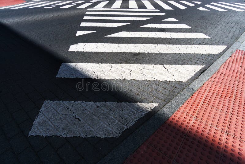 Several crosswalk near the sidewalk