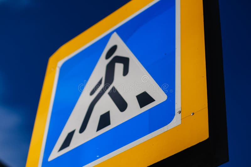 Crosswalk sign blue warning pedestrian. traffic royalty free stock photos Crosswalk sign blue warning pedestrian. traffic royalty free stock photos