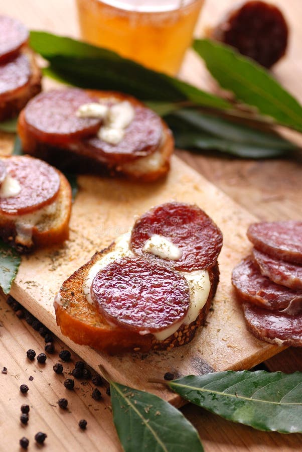 Crostini with salami stock image. Image of food, cuisine 33064447