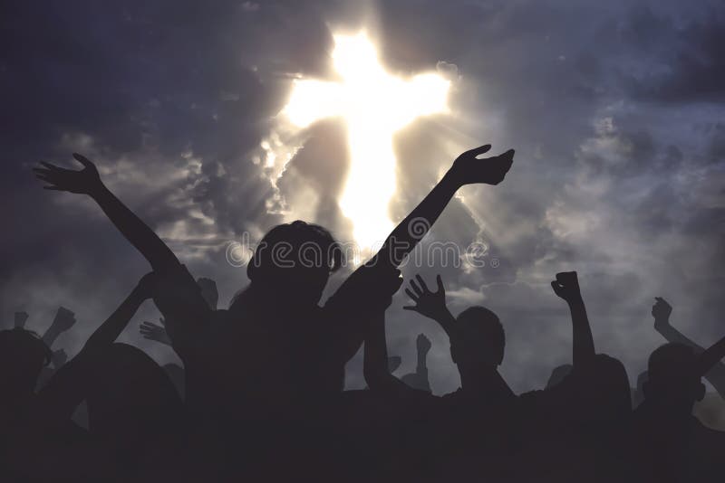 Crowd of christian people praying together to god