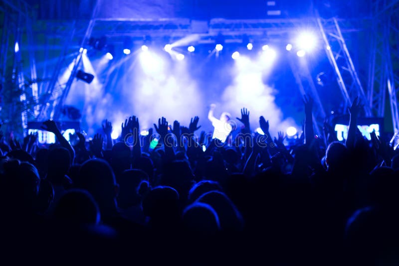 Crowd at Concert and Blurred Stage Lights Stock Image - Image of ...