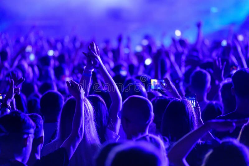 Crowd of fans at a concert stock photo. Image of dance - 19883884