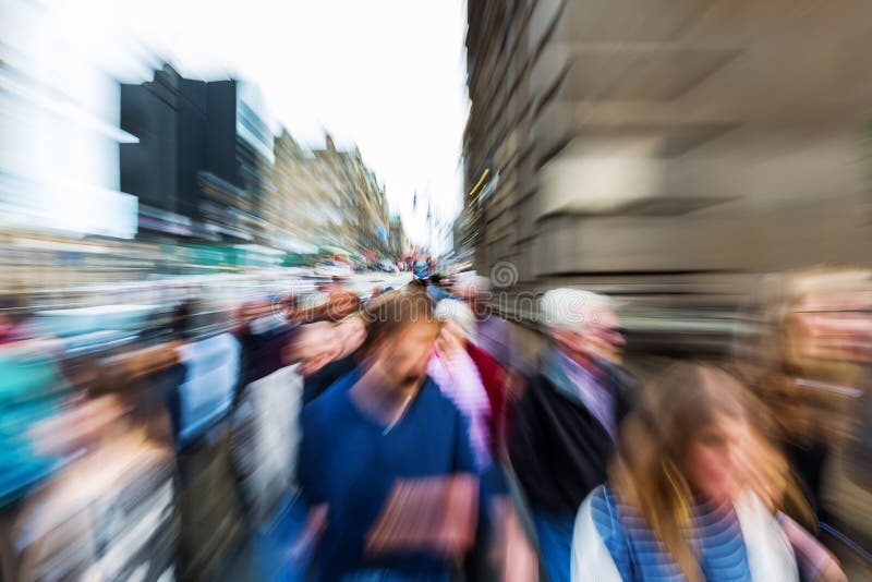Crowd of people in the city with zoom effect stock image Crowd of people in the city with zoom effect stock image