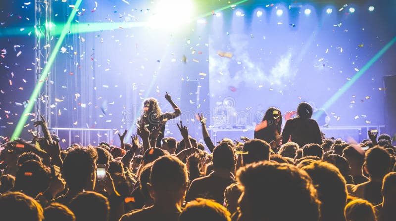 Crowd of people dancing at night club - Live concert festival event