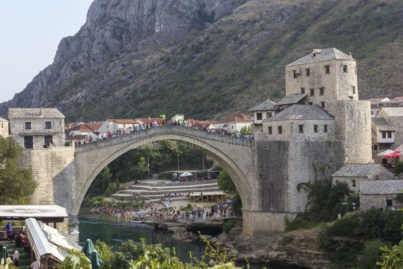 Crowd of people of the famous Mostar bridge in summer season royalty free stock image Crowd of people of the famous Mostar bridge in summer season royalty free stock image