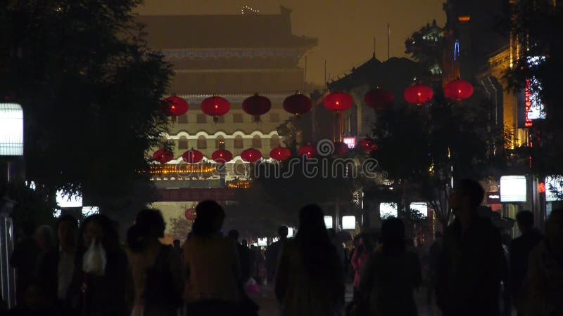 Crowd walk on Chinatown,China Beijing night market,memorial arch & lantern.
