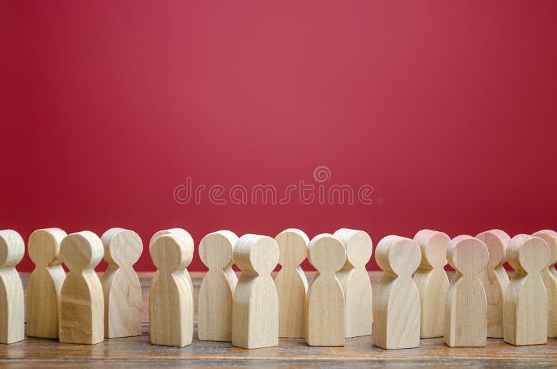 A crowd of wooden figures of people. Society, demography. Customers and buyers, statistics, preferences of Population. group