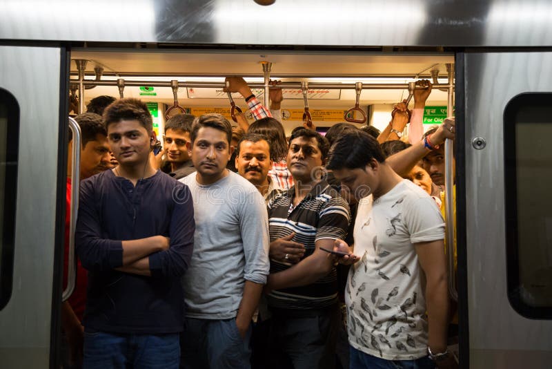 MAN WITH MEGAPHONE PUSH COMMUTERS INTO CROWDED TRAIN SO DOORS WILL CLOSE  RUSH HOUR AT PEOPLE S SQUARE SHANGHAI CHINA Stock Photo - Alamy