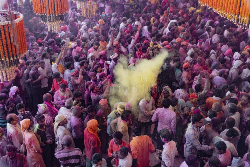 Crowds Can Be Seen Duirng Holi Festival in India, Throwing Powdered ...