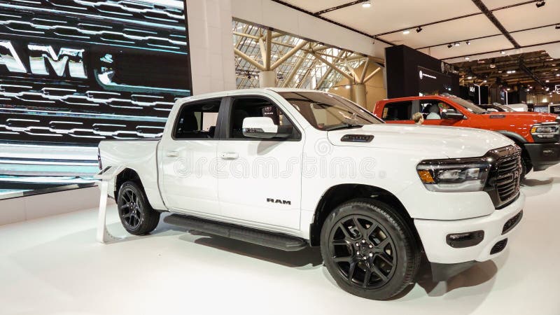 Crowds looking at new car models at Auto show. RAM truck on display. National Canadian Auto Show with many car brands. Toronto ON stock photo