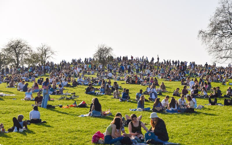 Crowds of people on Primrose Hill, London, UK