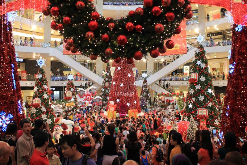 Crowds in shopping mall at Christmas stock photos