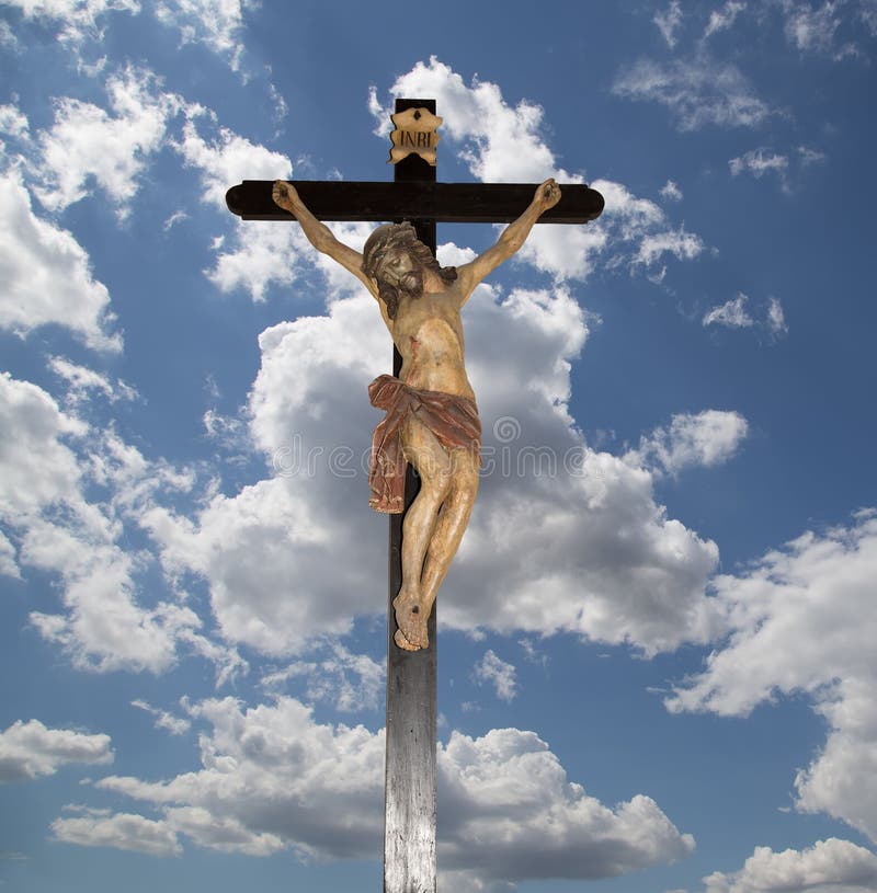 Crucifixion jesus christ statue on the sky background