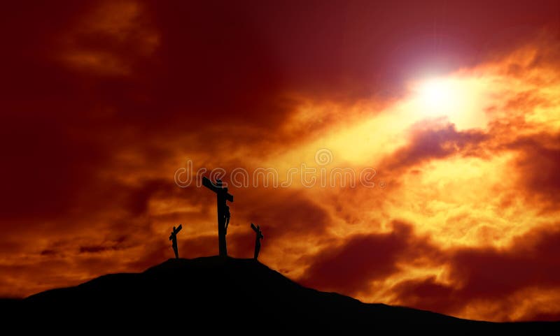 A depiction of the crucifixion of Jesus Christ on a cross with 2 other robbers against a dramatic sunset with rays of light breaking through the clouds onto the cross and lens flare for effect. Concept of the death of Jesus on Good Friday and His resurrection on Easter Sunday. Horizontal orientation with copy space. A depiction of the crucifixion of Jesus Christ on a cross with 2 other robbers against a dramatic sunset with rays of light breaking through the clouds onto the cross and lens flare for effect. Concept of the death of Jesus on Good Friday and His resurrection on Easter Sunday. Horizontal orientation with copy space.