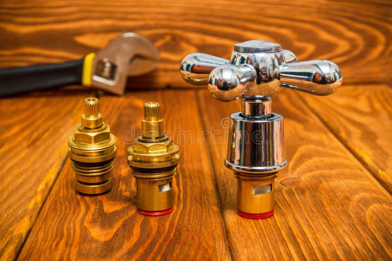 Cruciform hot and cold water main switch of spare parts stock photography Cruciform hot and cold water main switch of spare parts stock photography