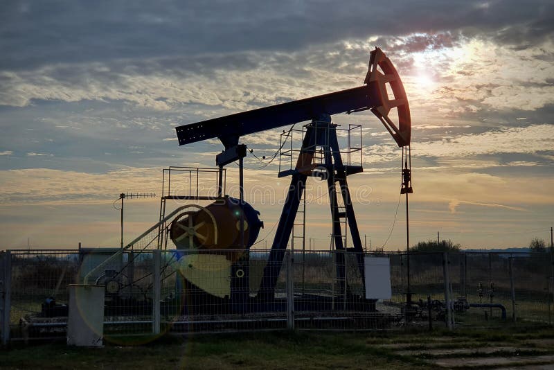 Crude Oil Well at Sunrise. Fossil Fuel Extraction. Stock Photo - Image of  environment, diesel: 199884688