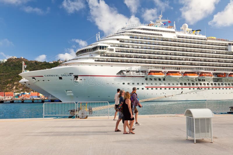 Cruise Passengers Walk Along Pier to Cruise Ship