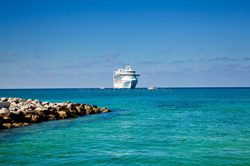 Cruise Ship Anchored on Tropical Island