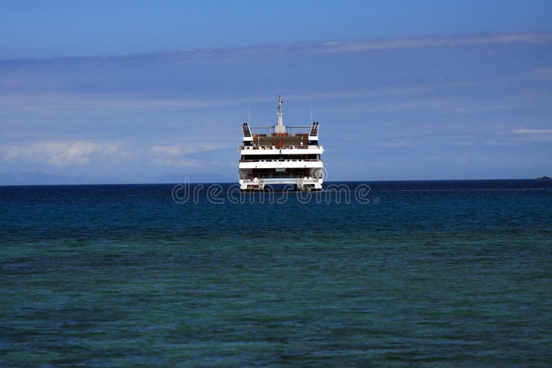 Cruise ship anchored in the tropics