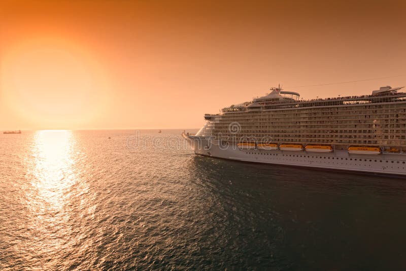 Cruise Ship Sailing into Sunset