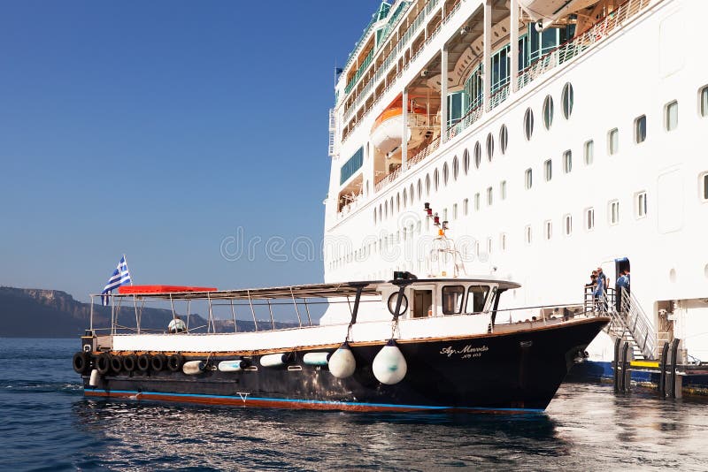 Cruise Ship and Tender, Santorini stock photography