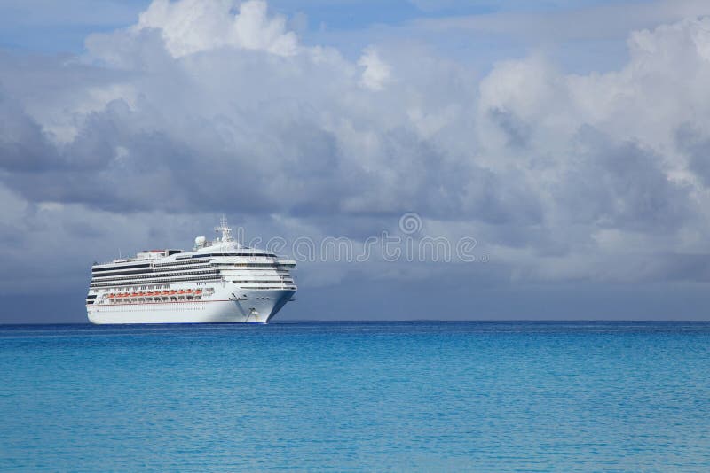 Cruise ship in tropical island port royalty free stock photo Cruise ship in tropical island port royalty free stock photo