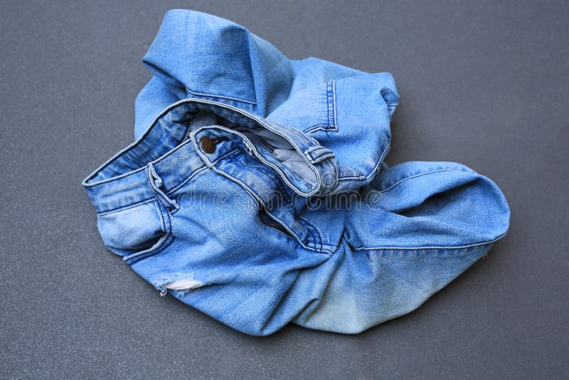 Crumpled Jeans on Floor stock image. Image of cotton 48531261